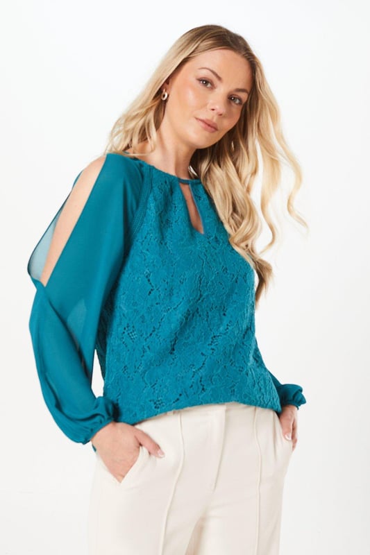 Featuring a delicate lace fabric and elegant chiffon sleeves, this top is not only stylish but also comfortable to wear. This is the perfect top to wear for any occasion! Stay on-trend and express your unique style with this Premium Lace  Sleeve Top.