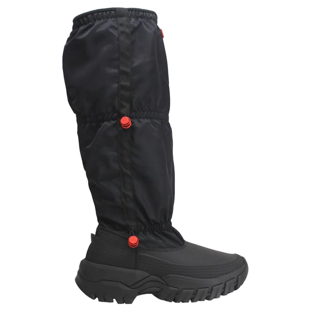 The Hunter Wanderer Tall Women's Black Snow Boots are designed to provide excellent protection, warmth, and style for winter conditions. Combining Hunter’s renowned craftsmanship with practical features, these tall snow boots are ideal for snowy, icy terrains, ensuring you stay comfortable and dry in even the harshest weather.
 
Key Features:
Fully Waterproof: 

Constructed with a waterproof outer layer, these boots are designed to keep your feet dry in wet, snowy, or slushy conditions.


Tall Design: 

The tall silhouette provides added protection from deep snow, keeping your legs and feet warm and dry during winter activities.


Thermal Insulation: 

Equipped with insulated lining to provide superior warmth, these boots are designed to keep your feet comfortable even in freezing temperatures.


Durable Rubber Sole: 

Features a thick, high-traction rubber sole to ensure a strong grip on icy or slippery surfaces, enhancing stability and safety.


Adjustable Fit: 

The boots include an adjustable side strap to customize the fit for added comfort and support.


Classic Black Color: 

The sleek black design offers versatility and style, making these boots easy to pair with various winter outfits.


Hunter Branding: 

Subtle Hunter logo detailing on the front of the boots adds a touch of iconic style and authenticity.


 
The Hunter Wanderer Tall Women's Black Snow Boots are the perfect combination of style, warmth, and durability, making them ideal for winter weather while ensuring your feet stay warm, dry, and comfortable. Whether you're navigating snowy streets or hitting the slopes, these boots provide excellent protection and a modern, timeless look.