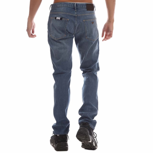 Mens Emporio Armani J06 Slim-Fit Washed Jeans in blue.- Five-pocket styling.- Zip fly and button fastening.- Belt loops.- Leather brand patch.- Metal rear pocket eagle.- Slim fit.- 98% Cotton  2% Elastane.- Ref: 8N1J061G0LZ943