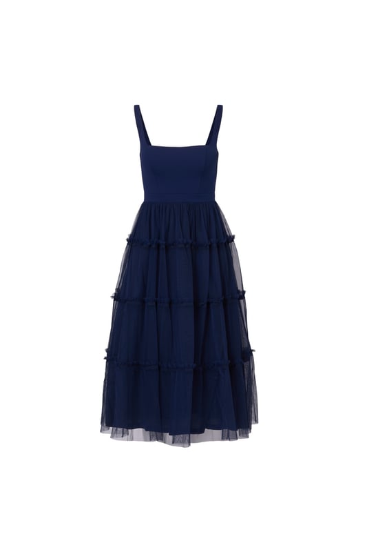 Modern fabric mixes make this classic fit and flare dress a sweet look. This midi dress features a fitted bodice with tank straps, a square neckline, and a tiered skirt. Fully lined, the bodice is crafted from a knit fabrication while the skirt is overlaid in mesh for added sweep. Pockets and a square back with centre zip closure complete this delightful party dress. Styled with nude heels and sparkling accessories, this midi dress is a timeless look from wedding guest duty to cocktail parties