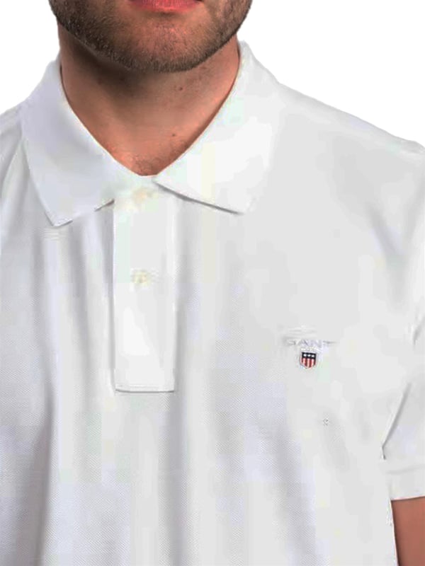 These Original Mens Designer Short Sleeve Gant Polos feature the brands Logo, a Contrasting Trim and a Button-Down Collared Neckline. Crafted With 100% Cotton, these Lightweight and breathable Regular Fit Polos are Suitable for Casual or Workwear.