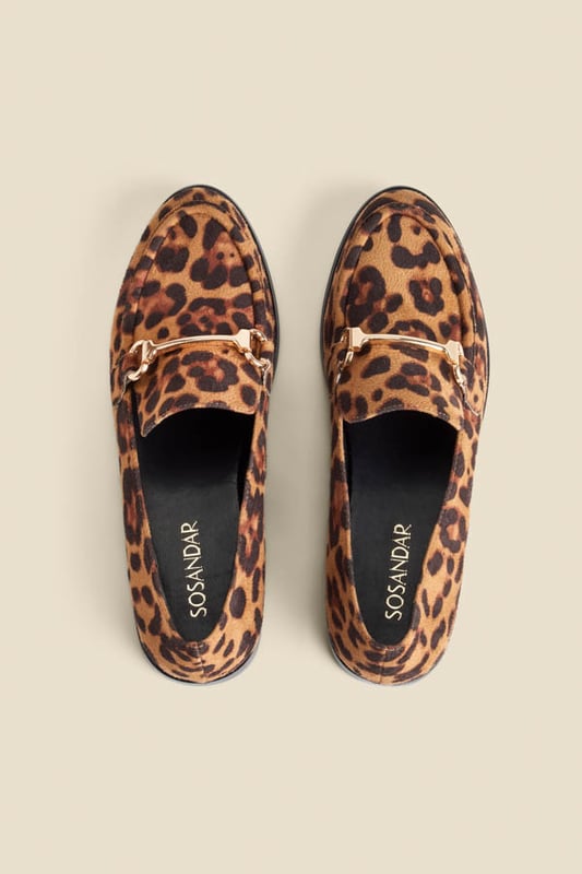 Leopard is a neutralSoft round toe silhouetteTimeless gold snaffle trim for a luxe touch Work smart, weekend cool Effortlessly cool with jeans and a blazer Add a pop of print to an all-black look