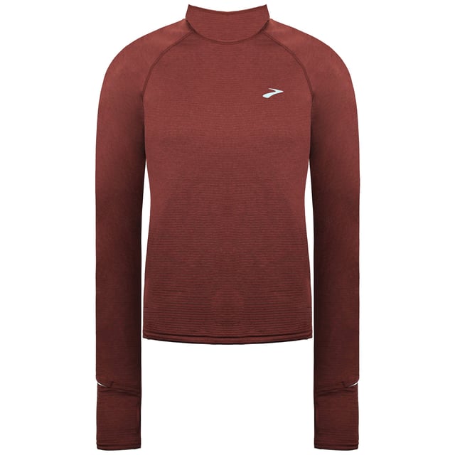 The Brooks Notch Thermal 2.0 Women's Top is designed to keep you cozy and comfortable during chilly runs or outdoor workouts. With its soft, insulating fabric and thoughtful features, this top is perfect for layering or wearing on its own in cold weather.

Key Features:
Manufacturer Colour:

Run Raisin

Thermal Insulation:

Soft, brushed thermal fabric traps heat effectively, keeping you warm on cold-weather runs without adding bulk.


Moisture-Wicking Technology:

DriLayerÂ® fabric wicks sweat away, ensuring you stay dry and comfortable throughout your workout.


Breathable Comfort:

Breathable material maintains warmth while preventing overheating during high-intensity activities.


Thumbholes and Extended Sleeves:

Built-in thumbholes provide extra coverage and warmth for your hands while keeping sleeves securely in place.


Semi-Fitted Design:

Tailored to contour the body without restricting movement, allowing for easy layering.


Secure Storage:

Includes a discreet zippered pocket to store small essentials like keys, cards, or gels.


Reflective Elements:

Subtle reflective accents enhance visibility in low-light conditions, adding an element of safety for early or late runs.


Stylish Brown Color:

Rich brown hue combines a modern, earthy aesthetic with functionality for a versatile look.



Whether you're running, hiking, or enjoying other outdoor activities, the Brooks Notch Thermal 2.0 Women's Brown Top is the ideal layer to keep you warm, dry, and focused on your goals.