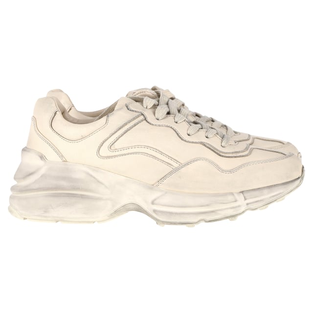 VINTAGE, RRP AS NEW
Luxury with an Edge: Embrace luxury with an edge in the Gucci Distressed Rhyton Sneakers in White Leather. The high-quality leather and distressed finish create a unique juxtaposition of elegance and ruggedness. These sneakers are ideal for individuals who seek a luxurious yet effortlessly laid-back footwear option that makes a statement.

Gucci Distressed Rhyton Sneakers in White Leather
Condition: Very good
Signs of wear: Include Box., Minor markings, Lightly used but very well maintained. Minor mark at soles & creasing, light scuffing at the soles and heels.
Packaging: Box, Dust bag
Color: White | ecru
Material: Leather
Size: EU37.5
Measurements: Heel height: 50; Insole length: 280
SKU: NAPPUGBSH370869W