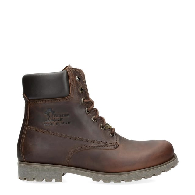 Step Out in Style and Comfort with Panama Jack Boots Whether you're trekking through rugged countryside trails or navigating urban streets, the original Panama Jack 03 C8 Mens Lace Up Boot is your perfect companion. Boasting a classic design with a plain round toe and a brown padded leather collar, these boots exude timeless elegance. The stitched commando sole ensures durability and stability on any terrain. For the gentlemen, the Men's Brown Panama Jack 03 Lace-up Ankle Boots are designed to withstand the elements. Featuring a waterproof smooth nubuck upper, soft padded ankle shaft, and warm lining, these boots keep your feet cozy and dry. The embossed logo on the heel and hexagonal metal eyelets add a touch of sophistication to their rugged charm. Key Features: Classic Design: The Panama 03 boots blend design, quality, and comfort seamlessly, offering a timeless aesthetic for both men and women. Versatile Wear: Whether you're exploring the city streets or conquering mountain trails, these boots are perfect for all your daily adventures. Waterproof Construction: Crafted from waterproof vintage nappa leather with leather lining, these boots ensure your feet stay dry and comfortable in any weather. Anatomical Support: Enjoy enhanced comfort and hygiene with the anatomically formed insole that provides a perfect fit for your feet. Durable and Slip-Proof: The rubber outsole offers flexibility, durability, and slip-proof traction, providing stability on various surfaces. Made in Spain: With a shaft height of 18 cm, these boots are expertly crafted in Spain, ensuring superior craftsmanship and quality. Step into Panama Jack boots and experience the perfect blend of style, durability, and comfort for your everyday adventures. Made for those who appreciate quality and craftsmanship, these boots are your trusted companion wherever your journey takes you