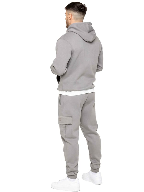 Enzo Mens Overhead Hoodie Tracksuit Set. Regular Fit, Long Sleeve Hoodie with Cuffed Wrists and Adjustable Drawstrings. Features EZ Logo On Chest And Joggers. Regular Fit Cargo Jogger. Elasticated Waistband With Adjustable Drawstring. Features 2 Side Slash Pockets, 2 Cargo Pockets, Single Welt Back Pocket. Ideal to use for Casual and Work wear.