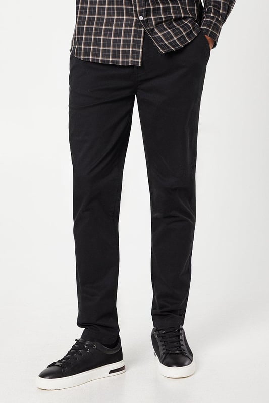 Slim fit design for a modern, tailored silhouette
        Versatile chino style suitable for various occasions
        Clean, streamlined appearance with minimal visible details
        Comfortable cotton-rich fabric for all-day wear
        Subtle branding for a refined look
    
    These Maine Premium Slim Fit Chino Trousers offer a perfect blend of style and comfort for the modern gentleman. The slim fit cut creates a sleek silhouette that flatters the body without compromising on ease of movement. Ideal for both casual outings and smart-casual events, these trousers can be effortlessly dressed up or down. For a relaxed weekend look, pair them with a crisp white t-shirt and trainers. Alternatively, create a more polished ensemble by teaming them with a button-down shirt and leather brogues for a family gathering or casual workplace setting. The versatility of these chinos makes them a wardrobe essential, easily transitioning from day to night. Their timeless design ensures they'll remain a staple in your collection for seasons to come, offering endless styling possibilities for the fashion-conscious man.