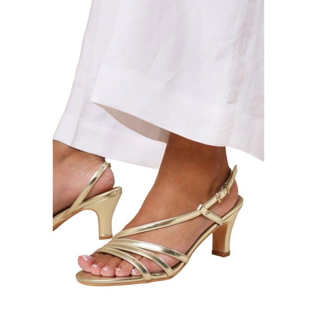 Obermaterial: Kunstleder. Marke: Where's That From. Schnalle. Laufsohle: Synthetischer Stoff. Mehrfachriemen, Slingback. Absatz: Low Block Heel. 5,08 cm. Design: Metallic. Zehenstil: offen.