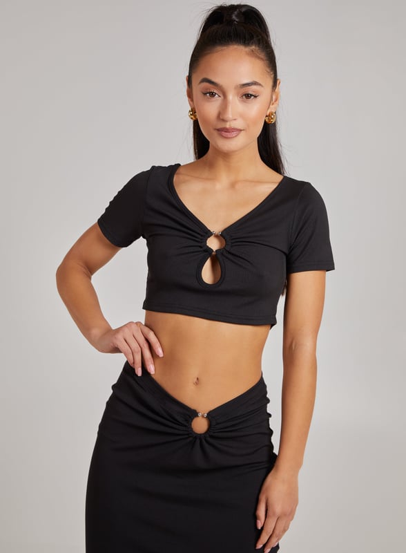The perfect weekend combo! Match this ring detailed ribbed top with our ring detailed ribbed skirt for a look to love this season!