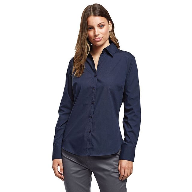 65% Polyester, 35% Cotton. Fabric: Poplin. Design: Plain. Fastening: Button-Down. Neckline: Collared. Cuff: Double Button. Sleeve-Type: Long-Sleeved. Hem: Rounded. 2 Back Darts. Sustainability: Amfori, BCI Approved, REACH, Sedex, WRAP Certified. 6 UK: 31 in. 8 UK: 33 in. 10 UK: 35 in. 12 UK: 37 in. 14 UK: 39 in. 20 UK: 45 in. 22 UK: 47 in. 24 UK: 49 in. 26 UK: 51 in. 28 UK: 53 in. 18 UK: 43 in. 16 UK: 41 in. 30 UK: 55 in.