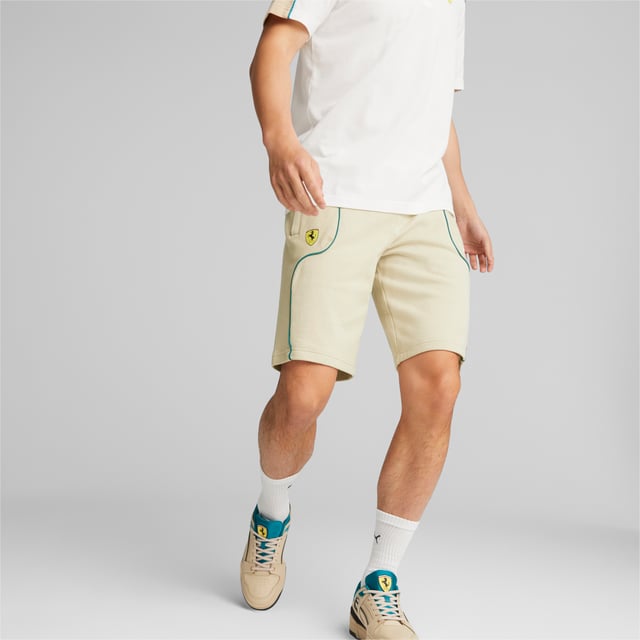 PRODUCT STORY: You don’t have to be trackside at Monza to get that race day feeling in these shorts. Designed for true fans of Scuderia Ferrari, they feature contrasting panels and piping as well as the world-famous Prancing Horse logo. An elasticated waist and generous pockets make them a practical and comfortable choice. FEATURES & BENEFITS: Recycled content: Made with at least 30% recycled material as a step toward a better future. DETAILS: Elasticated waist; Regular fit; Contrast panels on the legs; Contrast piping; Two side pockets; Printed PUMA Cat Logo on the left leg; Printed Ferrari shield on the right leg. Our model is 186 cm tall and is wearing size M.