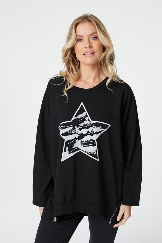 Add a star print oversized jumper to your closet. With a round neck, long sleeves and a hip length fit. Pair with skinny jeans trainers for a dressed down daytime look.