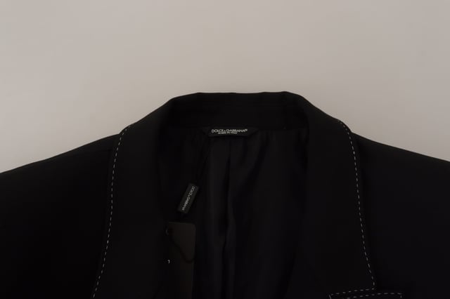 Stunning double breasted wool blazer with notch lapels
  Black color
  2-button fastening
  Logo details
  Made in Italy
  Material: 97% virgin wool 3% elastane
  Lining: 57% Cupro 43% Polyester
Material: 97% Virgin Wool 3% Elastane