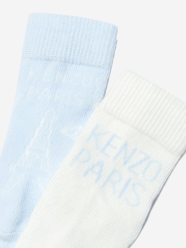 Introducing the Baby Socks Set (2 Pack) in Blue by Kenzo, an extraordinary addition for your Baby Unisex's gifting choices. Unique features include:  Stylish Design: Boasting chic Kenzo aesthetics, these socks infuse fashion into babywear. Premium Comfort: Crafted from refined materials, ensuring ultimate comfort and warmth for little feet. Ideal Gift: Packaged in a gorgeous set of 2, they make an ideal gift for baby showers or birthdays. Universal Appeal: With a vibrant blue hue, these unisex socks reflect a modern, trendy look. Order a set today and let your baby step into style!