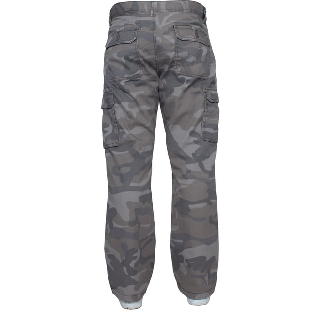 These KZ116 Kruze Camo Work Pants Features 2 Front Pockets, 2 Buttoned Back Pockets, 2 Velcro Side pockets and a zip fly fastening. Crafted with 65% Polyester and 35% Cotton, these Combat Trousers are a loose fit with adjustable toggle to the hems.