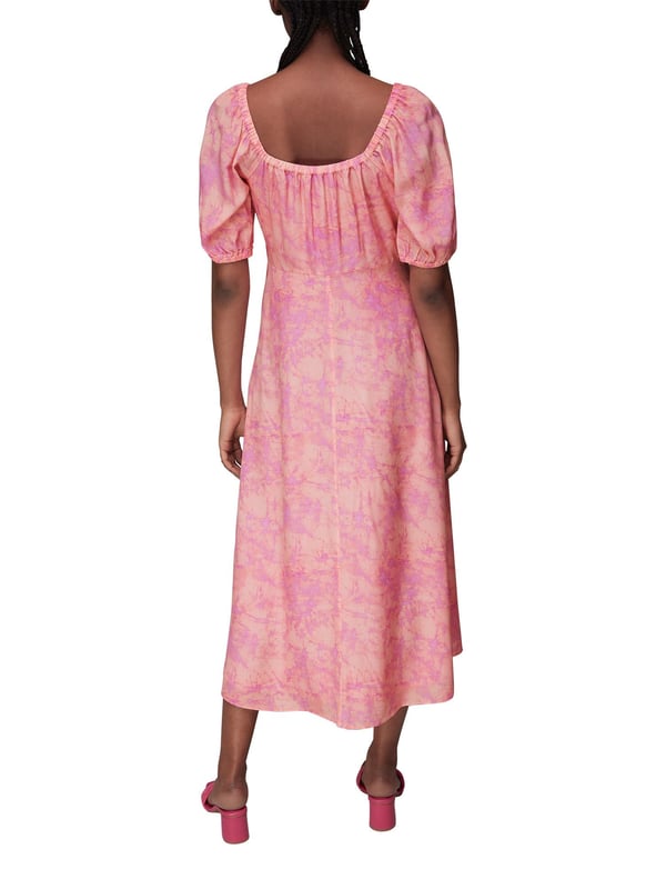 Introducing the exquisite Cracked Batik Silk Midi Dress, a stunning statement piece perfect for weekend ventures and day events. Crafted from premium silk, adorned with an enchanting batik print, and complete with charming short sleeves and scoop neckline, this dress is an effortless blend of sophistication and style.