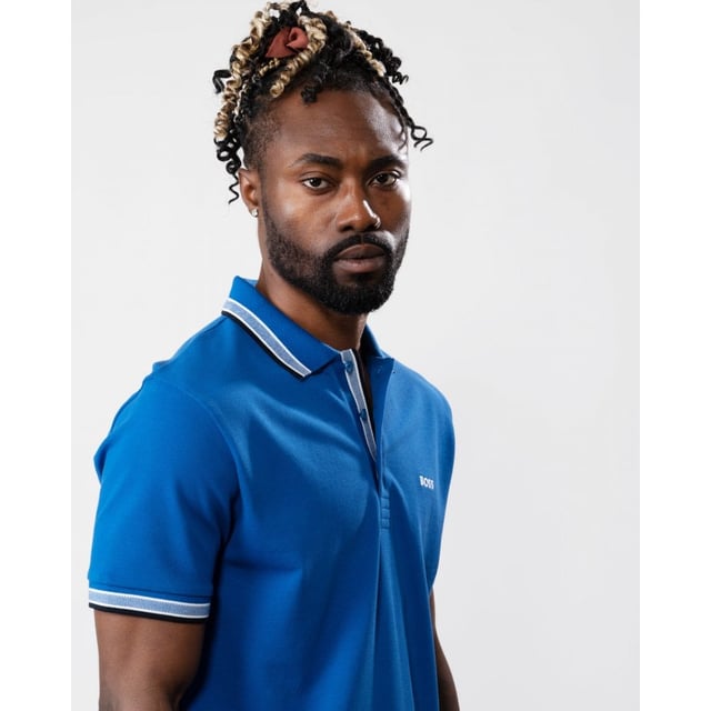 A signature polo shirt by BOSS Menswear, cut to a regular fit. Featuring contrast tipping and a logo at the left chest, this short-sleeved polo shirt is designed in cotton piqué and detailed with further BOSS branding at the undercollar.
Regular fit. Flat-knit collar. Number of buttons: 3. Short sleeves. Flat-knit cuffs. Standard length
100% Cotton
50469055
Model is 5"8 and wears size M