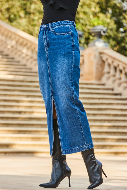 The skirt of the season
Made from our signature soft stretch denim
Classic mid-blue wash
On-trend midi length
Sits high on the waist for a flattering fit
Tuck in tees, camis, cardigans and going-out tops