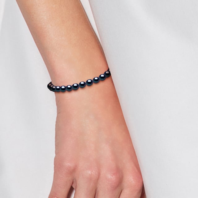 Bracelet made with Cultured Freshwater Pearls rice grain 4-5 mm - Black Color -Tahitian Style spring-loaded clasp White Gold 750 Length 18 cm , 7 in - Our jewellery is made in France and will be delivered in a gift box accompanied by a Certificate of Authenticity and International Warranty