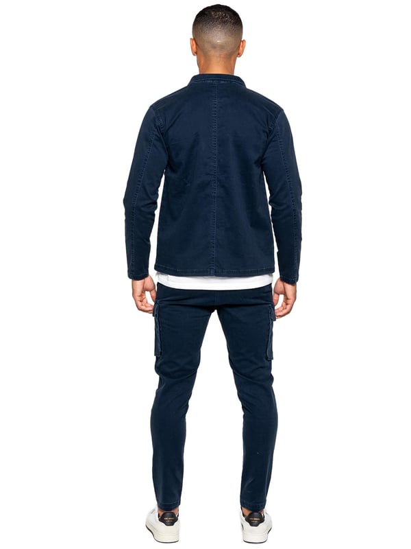 Enzo Mens Cargo Trousers. Regular Fit, Straight Leg, Enzyme Wash. 5 Pocket Design. 2 Side Pockets, 2 Cargo Pockets With Velcro Fastening. Single Back Welt Pocket. Elasticated Waistband With Adjustable Drawstring