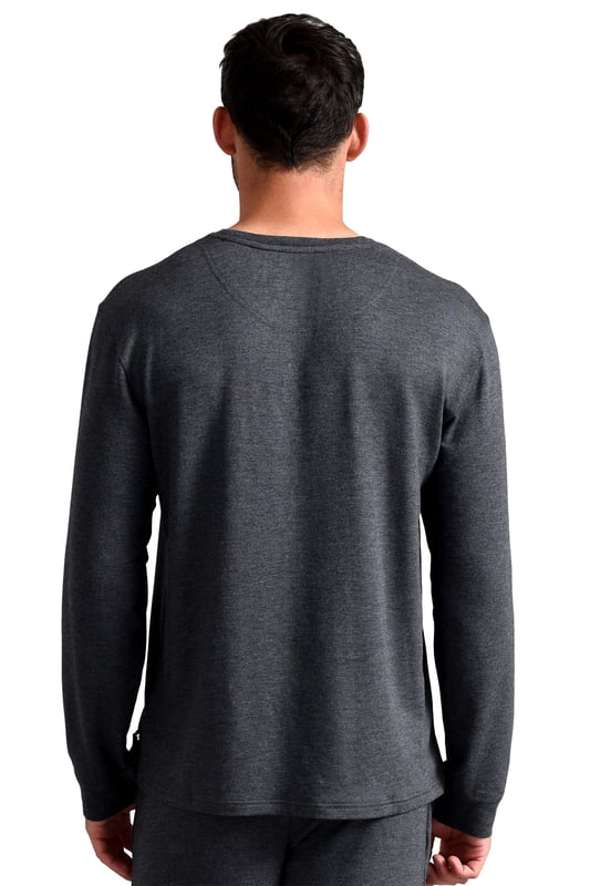 Introducing the Ted Baker long Sleeve T-Shirt Pyjama Top, a luxurious and comfortable addition to your nightwear collection. Made from a blend of 93% modal and 7% elastane, this pyjama top is incredibly soft and stretchy, providing maximum comfort and flexibility while you sleep. The fabric is also breathable, ensuring that you stay cool and comfortable all night long.Available in three sizes, medium, large, and x-large, and four colours, including charcoal, navy, burgundy, and green, this pyjama top is perfect for any style and preference. The classic design features a crew neckline and long sleeves, making it easy to wear and style with any pyjama bottoms.One of the main benefits of this pyjama top is its high-quality material. The modal and elastane blend is not only soft and comfortable but also durable and long-lasting. This means you won't have to replace it as often, making it a cost-effective choice in the long run.In addition, the Ted Baker long Sleeve T-Shirt Pyjama Top is versatile, making it perfect for more than just sleepwear. You can wear it as a casual top for lounging around the house or running errands. The classic design and variety of colours make it easy to style with any outfit.