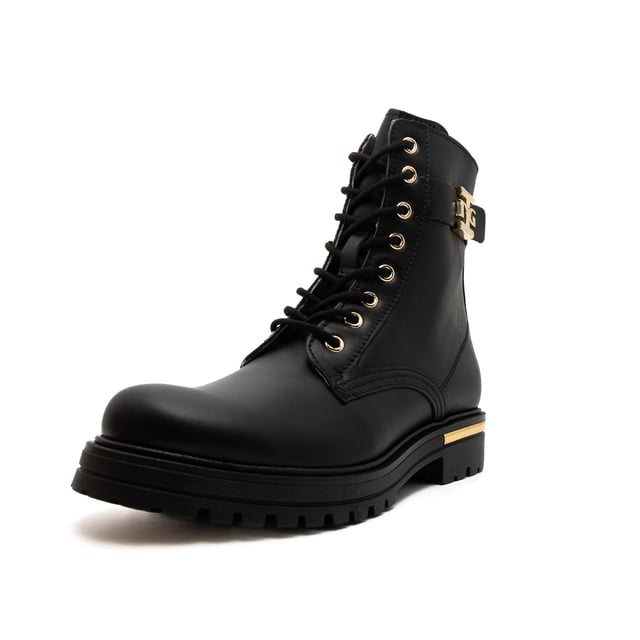 Color: Negro 100 Corte: Piel Interior: Piel Suela: Goma Cierre: Cremallera y cordones Detalles Logo de la marca dorado y acabado en el talón Ajuste: Regular Ocasión: Tiempo libre