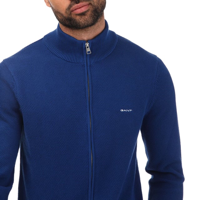 Mens Gant Cotton Pique Zipped Cardigan in blue.- Full zip fastening.- Ribbing at hem and sleeve cuffs.- Contrast stripe detail on inside neck rib.- GANT logo embroidered at chest.- Relaxed fit.- 100% Cotton.  - Ref: 8040524436