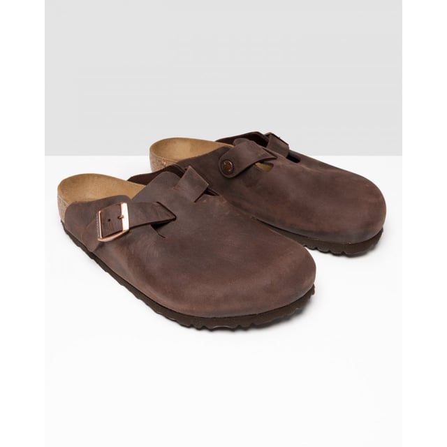 Men's Birkenstock Boston Leather Sandals in Brown Dating back to 1774 and originating from Germany BIRKENSTOCK is globally known for their signature footwear styles influenced by two and a half centuries of brand history. Providing comfort and durability they present these mens Boston Leather Slip On Shoes featuring their signature Birko-Flo skin-friendly material. Details: brown colourway adjustable buckle strap round toe cork footbed leather upper tonal stitching and embossed branding to side to complete.