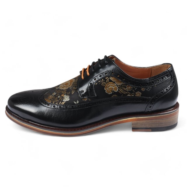 Add a unique touch to your formal wardrobe with the Ross Men's Floral Print Leather Brogue Shoes. Crafted from 100% premium leather, these brogues combine style, durability, and comfort. Featuring classic brogue detailing with decorative patterns, they bring elegance and sophistication to any look.

Unique Floral Print for a bold, stylish statement
Premium Leather for durability and luxury
Classic Brogue Detailing for timeless appeal
Lace-Up Design for an adjustable fit