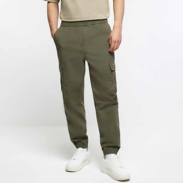 Slim fit, Utility pockets, Cuffed hem, Elasticated waist, Our model wears a UK 32 regular and is 186.5cm/6'1.5'' tall, Cotton for this product has been responsibly sourced, Cool Iron, Do Not Bleach, Do Not Dry Clean, Do Not Tumble Dry, Machine Wash 30C Gentle