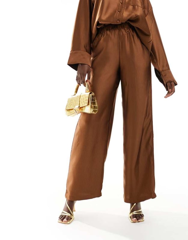 Trousers & Leggings by Y.A.S Part of a co-ord set Shirt sold separately High rise Elasticated waistband Wide legSold By: Asos