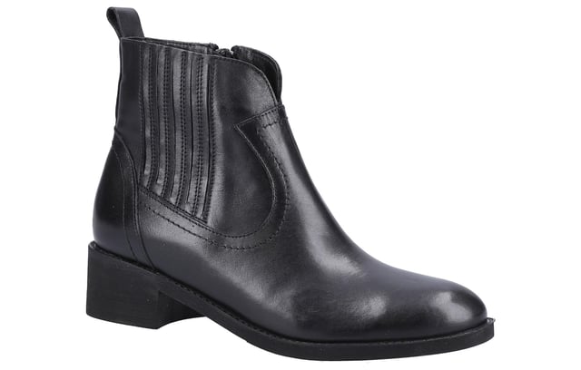 Step out in style with the Riva Georgie Ankle Boots, featuring a smooth leather upper and a comfortable block heel for effortless elegance. These chic boots offer a zip closure for easy wear, intricate stitch detailing that adds a touch of sophistication, and a heel pull tab for convenience. The buckle detailing enhances the overall design, making them the perfect addition to any wardrobe. 
 - Smooth leather upper 
 - Block heel 
 - Zip Closure 
 - Intricate stitch detailing 
 - Heel pull tab 
 - Buckle detailing