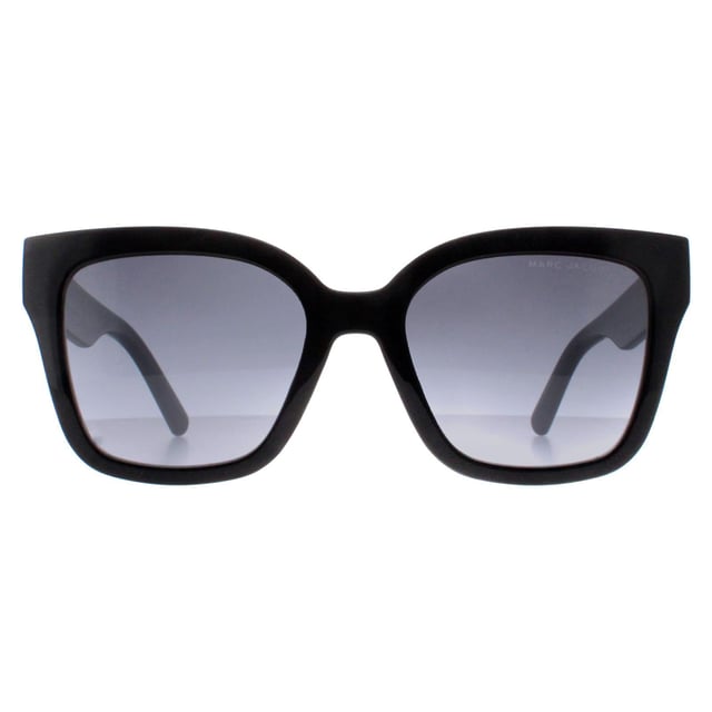 Marc Jacobs Square Womens Shiny Black Dark Grey Gradient MARC 658/S  Sunglasses feature a sleek and contemporary design with a nod to timeless style. Crafted with meticulous attention to detail, the frame showcases a blend of modern lines and classic elements, complemented by high-quality materials that promise both durability and comfort. The lenses not only offer optimal protection against harmful UV rays but also contribute to the sunglasses' undeniable allure. Finished with the iconic Marc Jacobs branding, these sunglasses effortlessly merge fashion forward aesthetics with everyday functionality, becoming an essential accessory for those who appreciate tasteful design and impeccable quality.