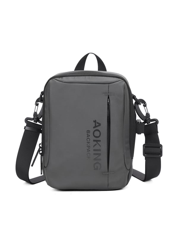 unisex schoudertas met ritssluiting. twee open binnenzakken. één voorkant met externe zakken met ritssluiting. verstelbaar en afneembaar in stoffen schouderband. in stoffen handvat. binnenste compartimenten. SchoudertasUnisex extern materiaal gevoerd met polyester binnenkant. Afmetingen: 16x8x23 cm. Modeproduct