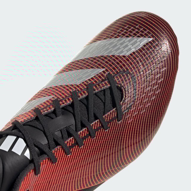 Rapid in every direction. As the game gets faster, players need to respond in a heartbeat. Built for soft ground, these adidas RS15 Ultimate rugby boots keep things lightweight with a synthetic forefoot. Rigid stability wings, ripstop fabric in the rearfoot and foam Sensepods in the heel ensure you stay strapped in for sprints. On top, asymmetrical lacing and 3D-printed elements help produce accurate kicks. Underneath, a Speedframe outsole adds biting traction.Made with a series of recycled materials, this upper features at least 50% recycled content. This product represents just one of adidas' solutions to help end plastic waste.  - Regular fit - Lace closure - Soft synthetic upper - Cushioned heel pods - Moulded stability wings - Speedframe outsole - Upper contains a minimum of 50% recycled content  Shipped by adidas