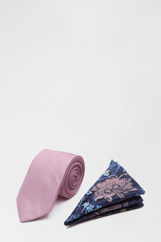 Complete the look with our collection of suit accessories. From classic bow ties, to lapel pins to braces and cuff links we've got everything you need to take suiting to the next level. Style: Pink Tie And Floral Pocket Set.  Ideal for: Occasion.  Design: Plain.  Model wears size UK 10 and is 5' 9" tall.