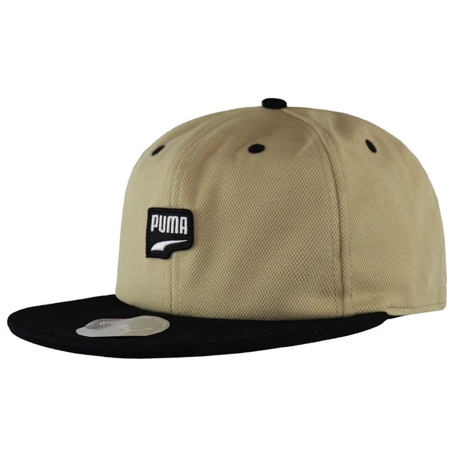 Puma Archive Downtown Men's Beige Cap – a stylish and versatile accessory that seamlessly combines sporty flair with urban sophistication. Elevate your casual ensemble with this beige cap from Puma's Archive Downtown collection, designed to offer both fashion and functionality.

Key Features:

 Classic Baseball Cap Design:  The Downtown cap features a classic and timeless baseball cap design, providing a comfortable and familiar fit. Puma's commitment to sportswear authenticity is evident in the cap's silhouette.

 Neutral Beige Color:  The beige color adds a touch of versatility, making this cap easy to pair with a variety of casual outfits. Whether you're heading to the gym, running errands, or simply enjoying outdoor activities, the neutral tone complements various styles.

 Embroidered Puma Logo:  Look for the iconic Puma logo prominently embroidered on the front of the cap. The logo serves as a symbol of quality, athleticism, and urban style, showcasing your affinity for a renowned sportswear brand.

 Durable Construction:  Crafted with durability in mind, the Downtown cap is made from high-quality materials. The sturdy construction ensures longevity, making it suitable for daily wear and various activities.

 Sporty and Urban Fusion:  The Archive Downtown collection from Puma embodies a fusion of sporty aesthetics with urban style. The Downtown cap captures this essence, making it a versatile accessory that seamlessly transitions from sporty to casual urban environments.

 Versatile Wardrobe Addition:  Whether paired with athletic wear, casual jeans, or shorts, the Puma Archive Downtown Men's Beige Cap effortlessly enhances your overall look. It's a go-to accessory for those who appreciate a blend of sporty and streetwear influences.