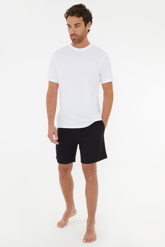 Unwind in ultimate comfort with this three pack of textured cotton pyjama shorts from Threadbare. These shorts are made from a soft touch cotton waffle fabric, feature an elasticated waistband with adjustable drawcords that make them comfy and easy to wear, and have two handy side pockets. Whether you plan on sleeping in them or relaxing on the sofa, these loungewear shorts are ideal.