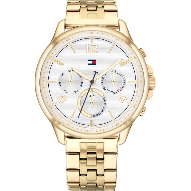 Diese Tommy Hilfiger Harper Multi Dial Uhr für Frauen ist das perfekte Zeitmessgerät zum Tragen oder Verschenken. Das goldene 38 mm runde Gehäuse in Kombination mit dem bequemen goldfarbenen Edelstahl sorgt dafür, dass Sie dieses atemberaubende Zeitpiece ohne Kompromisse genießen können. Angetrieben von einem hochwertigen Quarzwerk und wasserfest bis 3 bar, wird Ihre Uhr weiterhin präzise ticken. Diese elegante und praktische Uhr ist perfekt für alle Anlässe. Sie ist ein tolles Geschenk für Ihre Verwandten und Freunde - Die Uhr verfügt über eine Kalenderfunktion: Tag-Datum, leuchtende Zeiger, 24-Stunden-Anzeige. Hochwertiges Armband aus goldfarbenem Edelstahl mit einer Länge von 19 cm und einer Breite von 17 mm sowie einer Klappschließe mit Druckknopf. Gehäusedurchmesser: 38 mm, Gehäusehöhe: 8 mm, Gehäusefarbe: Gold und Zifferblattfarbe: Silber.