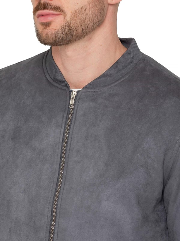 Introducing the Men's Suede Bomber Jacket, a versatile and fashionable wardrobe staple, perfect for layering. Made from soft suede, this jacket offers a luxurious texture and feel. It features a timeless bomber style with a zip-up front, ribbed cuffs, and hem for a comfortable, fitted look. Ideal for both casual and smart-casual settings, the premium suede enhances any ensemble with a touch of sophistication. The jacket also includes two convenient side pockets and an interior pocket for added functionality.