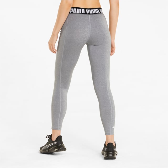 PRODUCT STORY Give your curves the ultimate hug in these fiercely feminine leggings. Haute and high waisted for a figure-flattering fit, and made using recycled fibres for a sleek spin on sustainability, dryCELL moisture-wicking technology to keep you cool and comfortable when the action heats up and bold PUMA branding, you'll be well suited for a serious sweat session. FEATURES & BENEFITS : dryCELL: PUMA's designation for moisture-wicking properties that help keep you dry and comfortable Contains Recycled Material: Made with recycled fibers. One of PUMA's answers to reduce our environmental impact. DETAILS : Tight fit High-waisted silhouette Forwarded side seams for freedom of movement Repeating PUMA Wordmark on waistband PUMA Cat Logo at left ankle