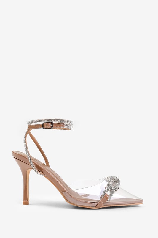 Where's That From Womens 'Monaco' Perspex Heel With Embellished Detail And Diamante Cross Strap Step into the spotlight with our Monaco Perspex Heel with Embellished Detail and Diamante Cross Strap. These stunning heels are designed to make a statement and add a touch of glamour to any outfit.
Key Features:
Effortless Style: The combination of perspex material, pointed toe, and diamante detail create a unique and eye-catching look. These high heels effortlessly elevate your style, making you the centre of attention wherever you go.
Secure Fit: The diamante heels not only add a touch of sparkle but also ensure a secure fit that hugs your foot.
Durable Construction: Made with high-quality materials, our Perspex Pointed Toe Heels are built to last. The sturdy construction and reliable stitching ensure their durability, making them suitable for any occasion.
Specifications:
Heel height: 3.5' (9 cm) approx
Toe shape: Pointed
Invest in our Monaco Perspex Heel with Embellished Detail and Diamante Cross Strap heels for a perfect combination of style, comfort, and glamour. Make a statement and turn heads wherever you go. Get yours today and step into a world of elegance and sophistication!