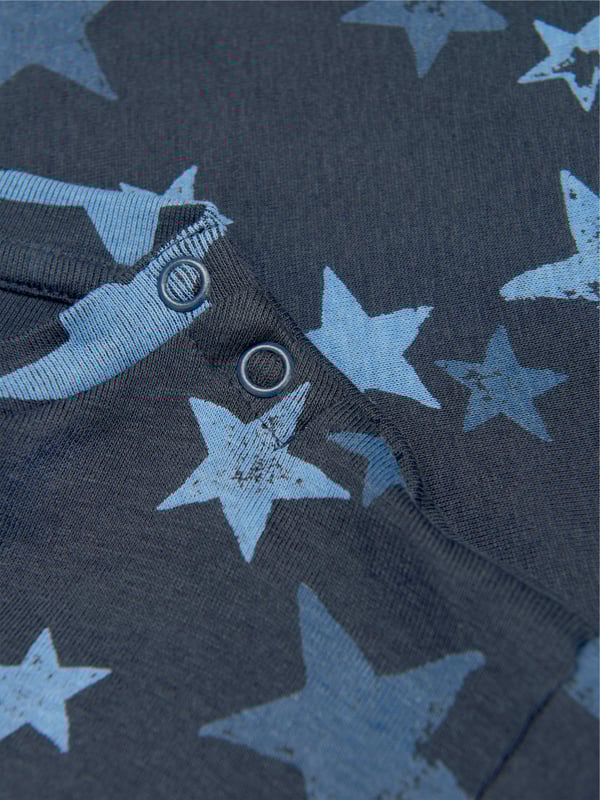 He will be the star of the show in this fun and fashionable baby boys' t-shirt by Molo. Decorated with a stylish star print, the navy long-sleeved top also has a popper button opening at the neck to help at changing times and is the perfect piece for layering when the weather cools down.