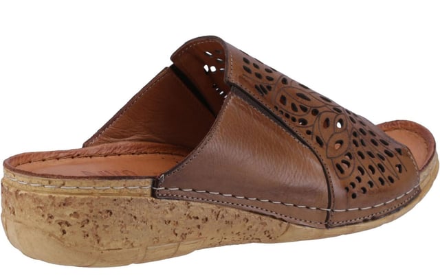 The Riva Cardigan Sandals offer a perfect blend of elegance and casual comfort. These open-toe wedge mules feature a refined leather upper with decorative cut-outs, adding a touch of sophistication to their design. The easy slip-on style ensures effortless wear, while the strap design provides a secure fit.
 Enjoy superior comfort with a lightly padded leather footbed and a lightweight bark-effect platform wedge heel that combines natural charm with modern style. Contrast stitching accents enhance these chic sandals, and the grippy outsole ensures stability with every step.
 - Leather upper 
 - Decorative cut out 
 - Easy slip on, open toe design 
 - Strap design 
 - Lightly padded leather foot bed
 - Contrast stitching accents
 - Bark/wood effect heel
 - Grippy outsole
