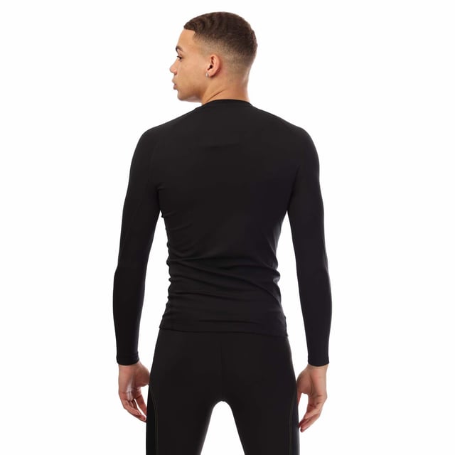 Mens Skins Series-2 Long Sleeve Top in black.- Round neck.- Long sleeves.- Reflective outline logos.- Medium level compression.- Squat proof.- Great absorbency and wicking qualities.- 83% Polyester  17% Elastane.- Ref: SW00200059001
