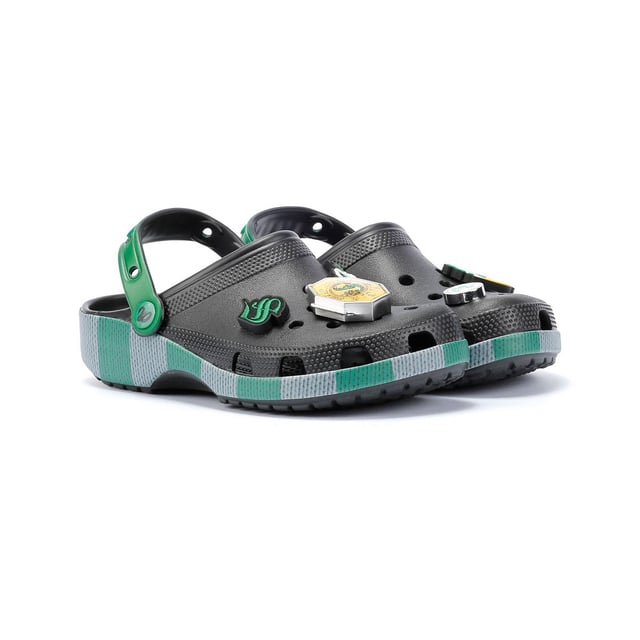 Inspired by Harry Potter’s Slytherin House scarf in green and grey, these Classic Clogs are lightweight, water-friendly, and buoyant. Featuring breathable ventilation ports and pivoting heel straps for a secure fit, they're perfect for fans seeking style and comfort. Customisable exclusive Slytherin-inspired Jibbitz™ charms.