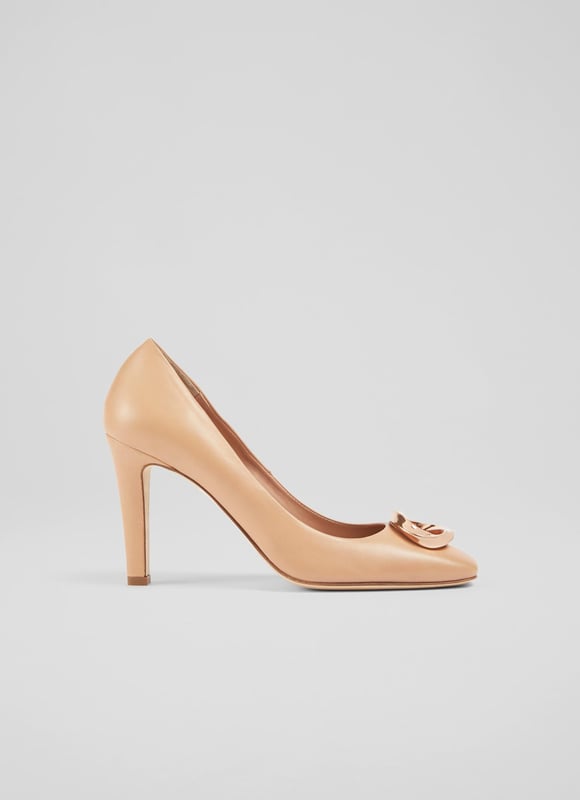 A high-heeled court with chic detailing, our Evelyn courts feel a little dressier than the classic styles. Beautifully-crafted in Italy from buttery camel leather, they have a round toe, a gold eternity ring embellishment - which is exclusive to LKB - a sleek shape and an elegant stiletto heel. Wear them to work or for spring occasions.