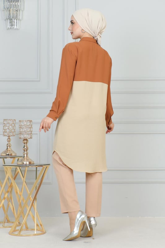 Stoffmerkmal: Hergestellt aus Belmando-Stoff.Produktmerkmal: Neues Hijab-Modemodell der Saison. Ungefüttert. Hat einen halben Reißverschluss vorne für einfache Verwendung. Manschettenknöpfe sind funktional. Aufgrund von Konzeptaufnahmen kann es leichte Farbabweichungen im Produkt geben. Das Model trägt Größe 40. Größe 38 Tunika-Maße: Produktlänge: 99 cm - Br