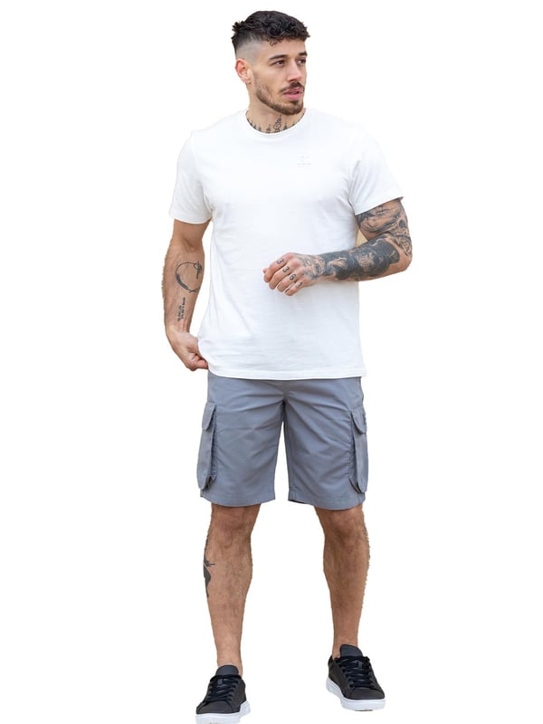 Expertly designed with top-quality ripstop fabric, these Enzo technical cargo shorts offer unparalleled durability. The convenient cargo pockets and zip side pockets make for easy storage, and the elasticated waistband with an adjustable drawstring ensures a comfortable fit. Upgrade your wardrobe and gear with this must-have for any outdoor enthusiast.