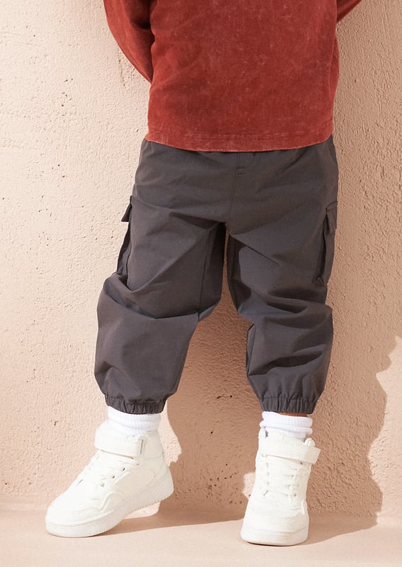 With an elasticated waist to keep them secure through all adventures. our new trousers are the perfect everyday style. Crafted from crisp paper poplin and cut to a relaxed fit. they'll be the coolest kids in the playground!.